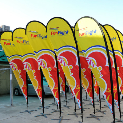 Banderas de publicidad en el exterior con promociones personalizadas de cuchillo tipo lágrima bandera de Bali bandera de la playa de arco con base de corsos